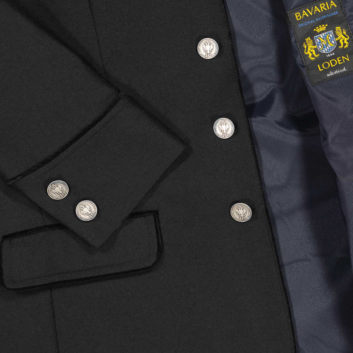 Detailansicht Amsel Janker Bogenhausen Schwarz – hochwertige Münzknöpfe, feiner Wollbrokat mit Stretch und edles Innenfutter